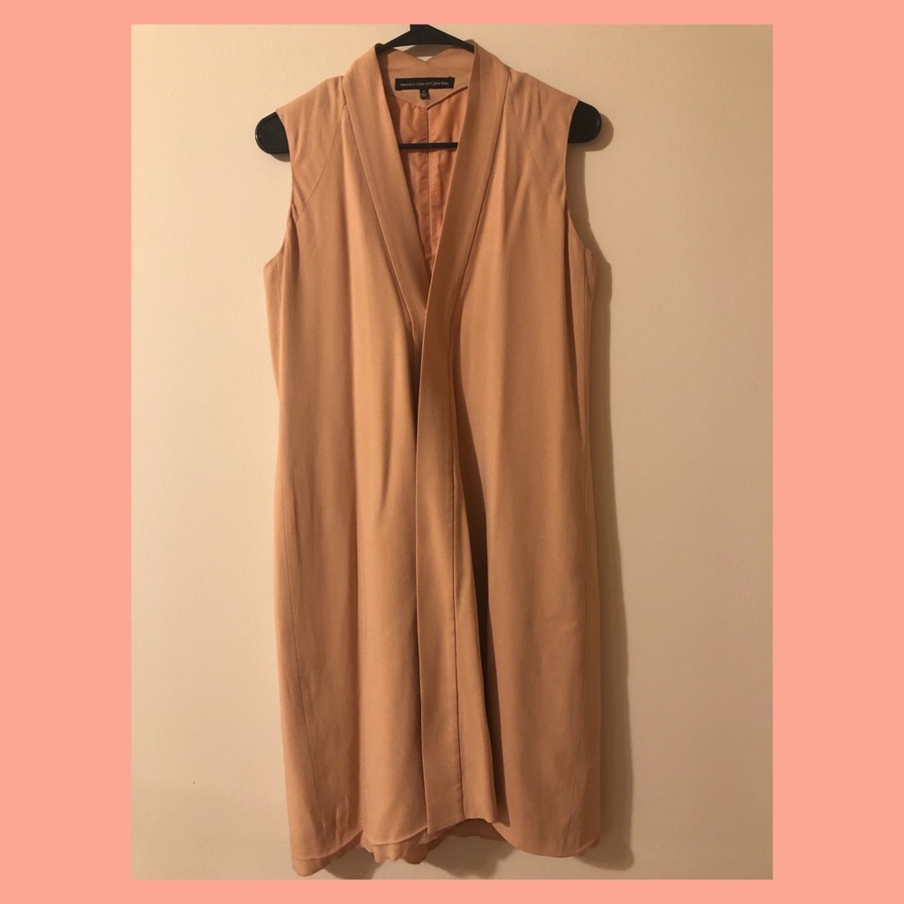 Nude sleeveless jacket